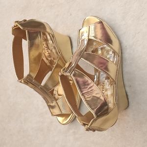 gold platform shoe with closure on the back